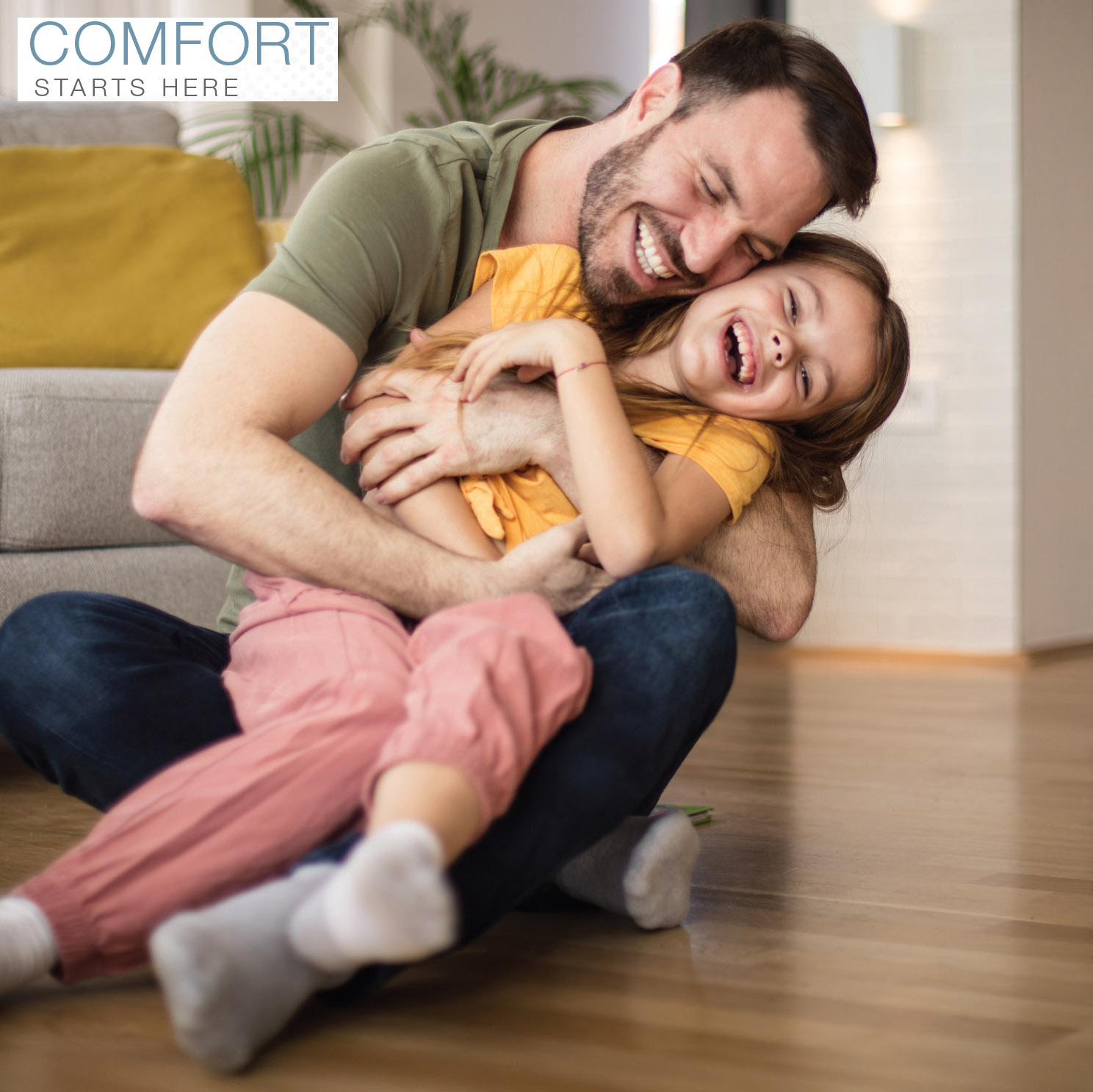 Father Daughter enjoying comfort of Rheem RA14AY Endeavor™ Line Classic Series Air Conditioners